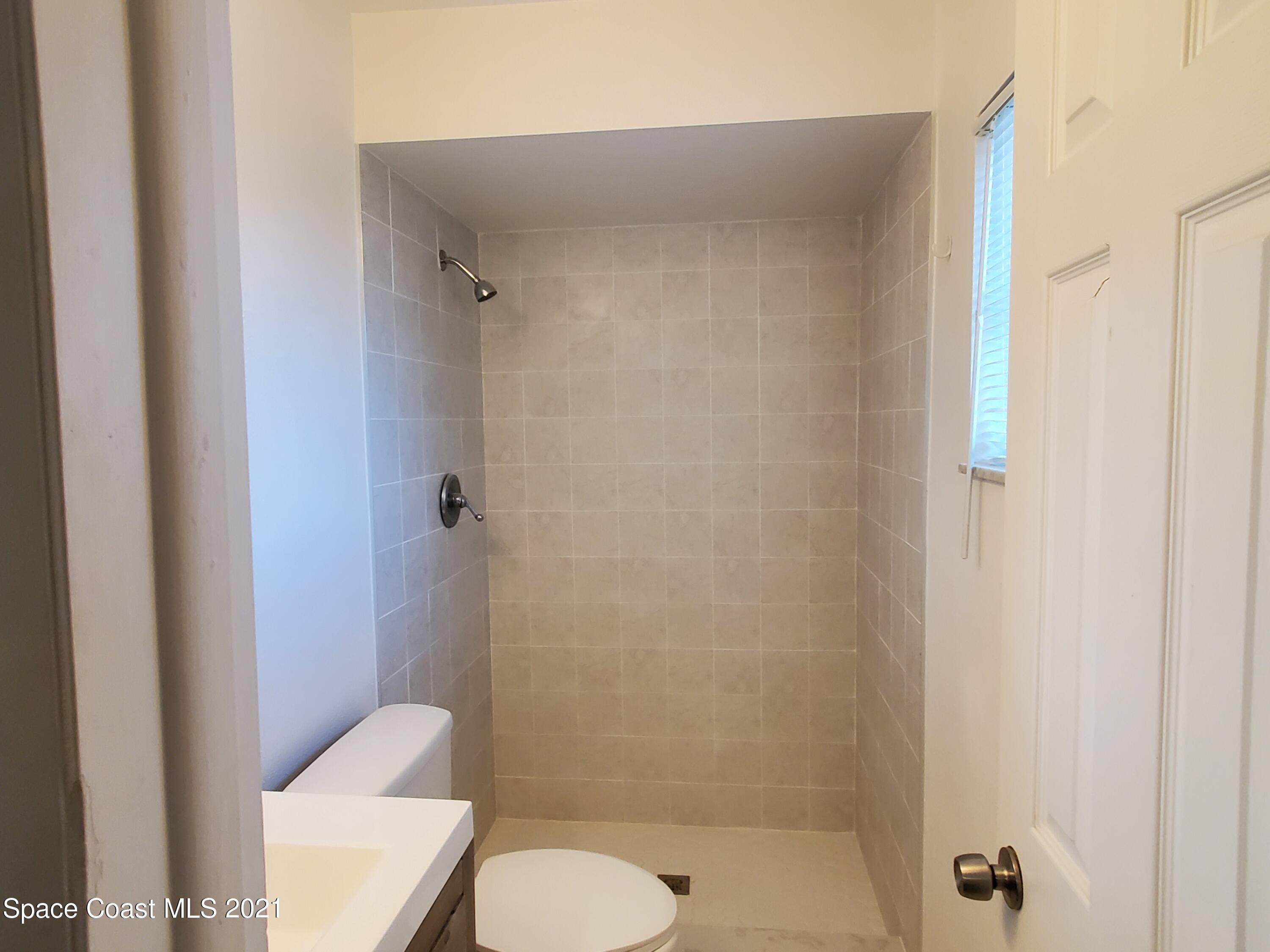2740 Rhapsody Street Northeast Palm Bay, FL 32905 - Photo 29 of 78 Master bath