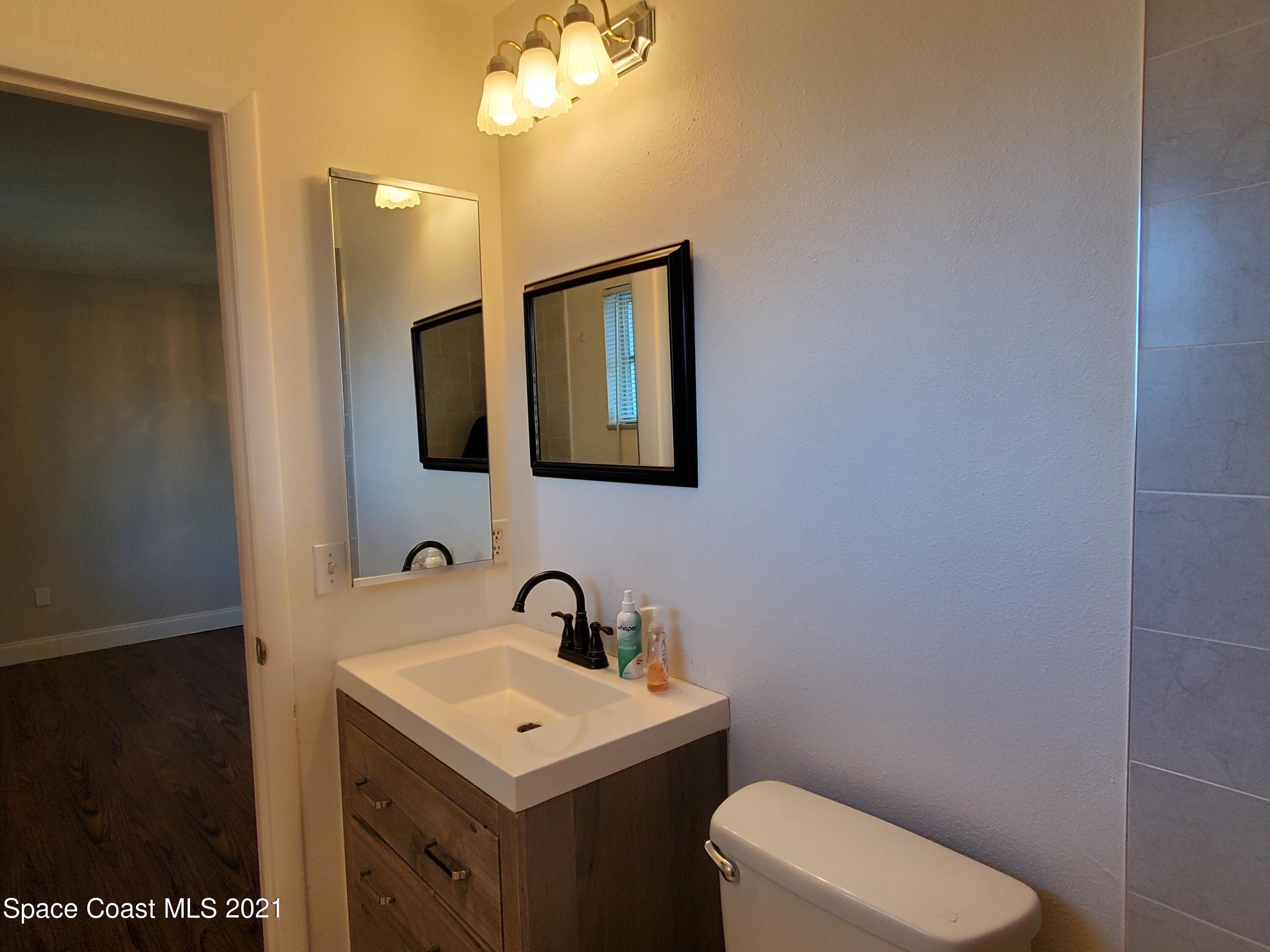 2740 Rhapsody Street Northeast Palm Bay, FL 32905 - Photo 30 of 78 Master bath