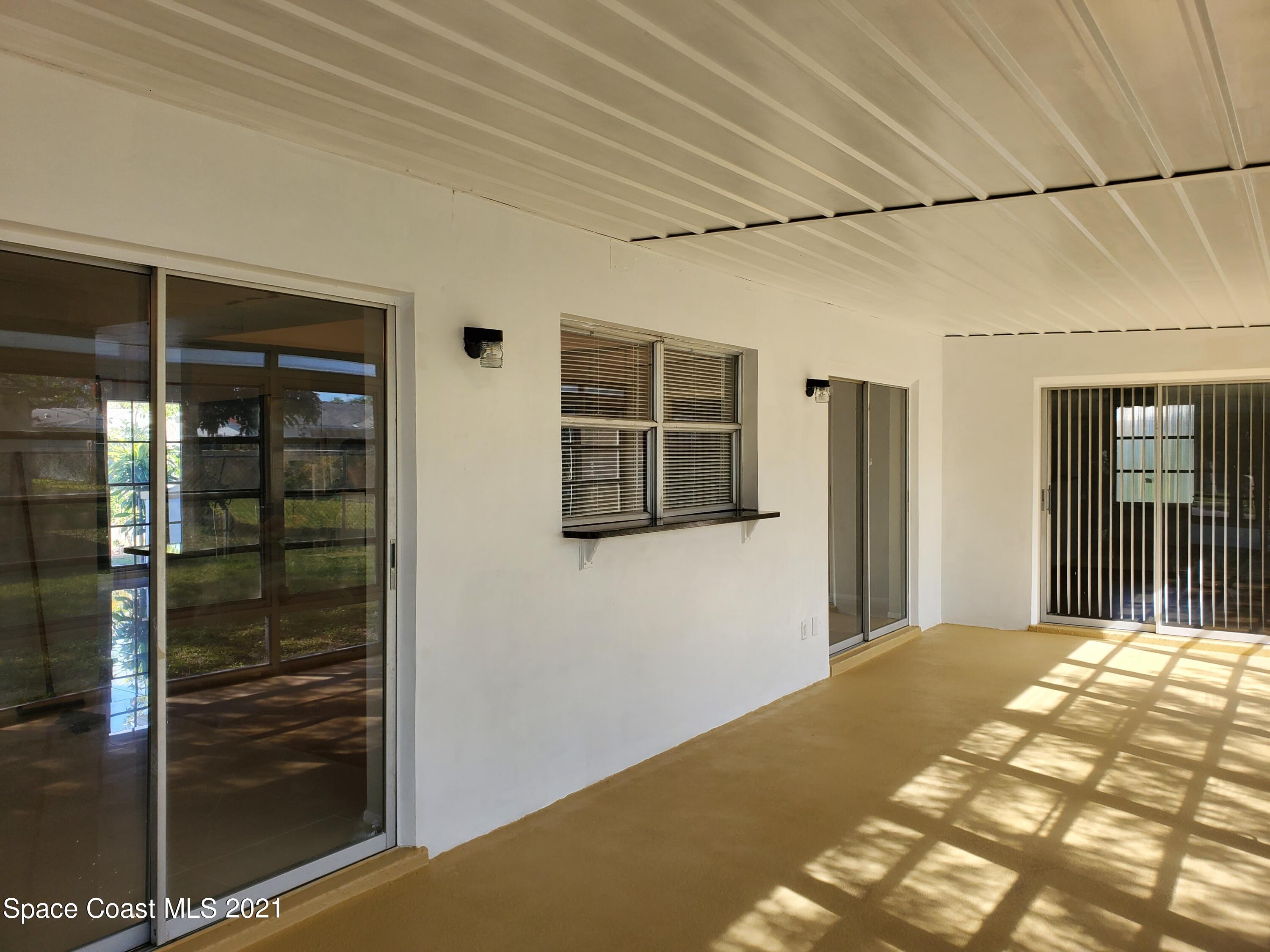 2740 Rhapsody Street Northeast Palm Bay, FL 32905 - Photo 54 of 78 Very large patio