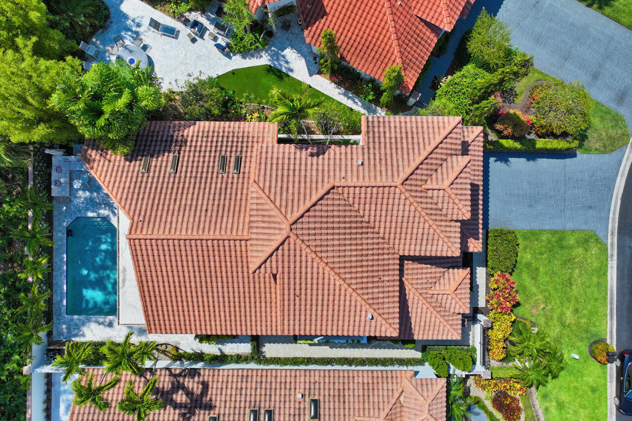 5809 Northwest 21st Way Boca Raton, FL 33496 - Photo 44 of 59 a view of house with a yard