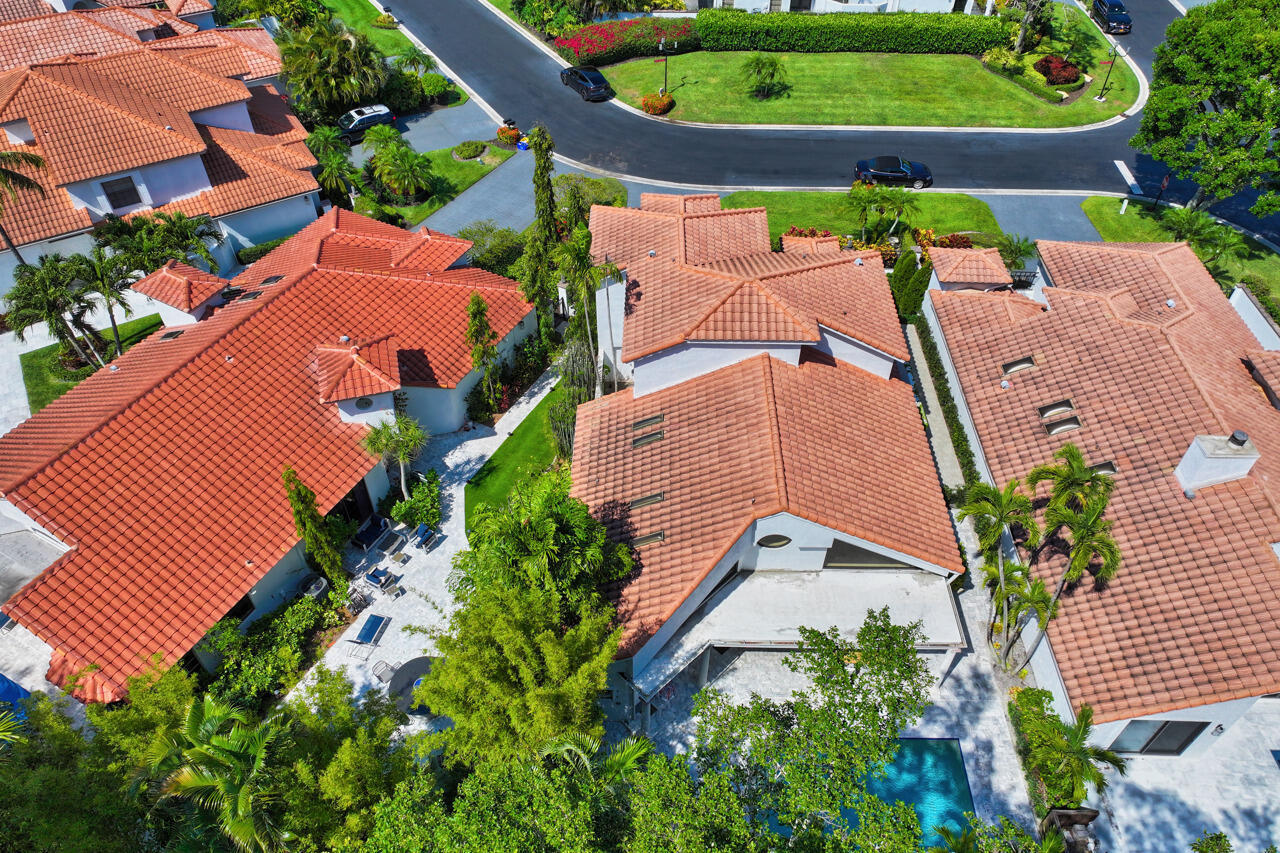 5809 Northwest 21st Way Boca Raton, FL 33496 - Photo 46 of 59 an aerial view of a house with a yard and outdoor seating