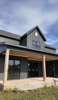 a house view with a outdoor space