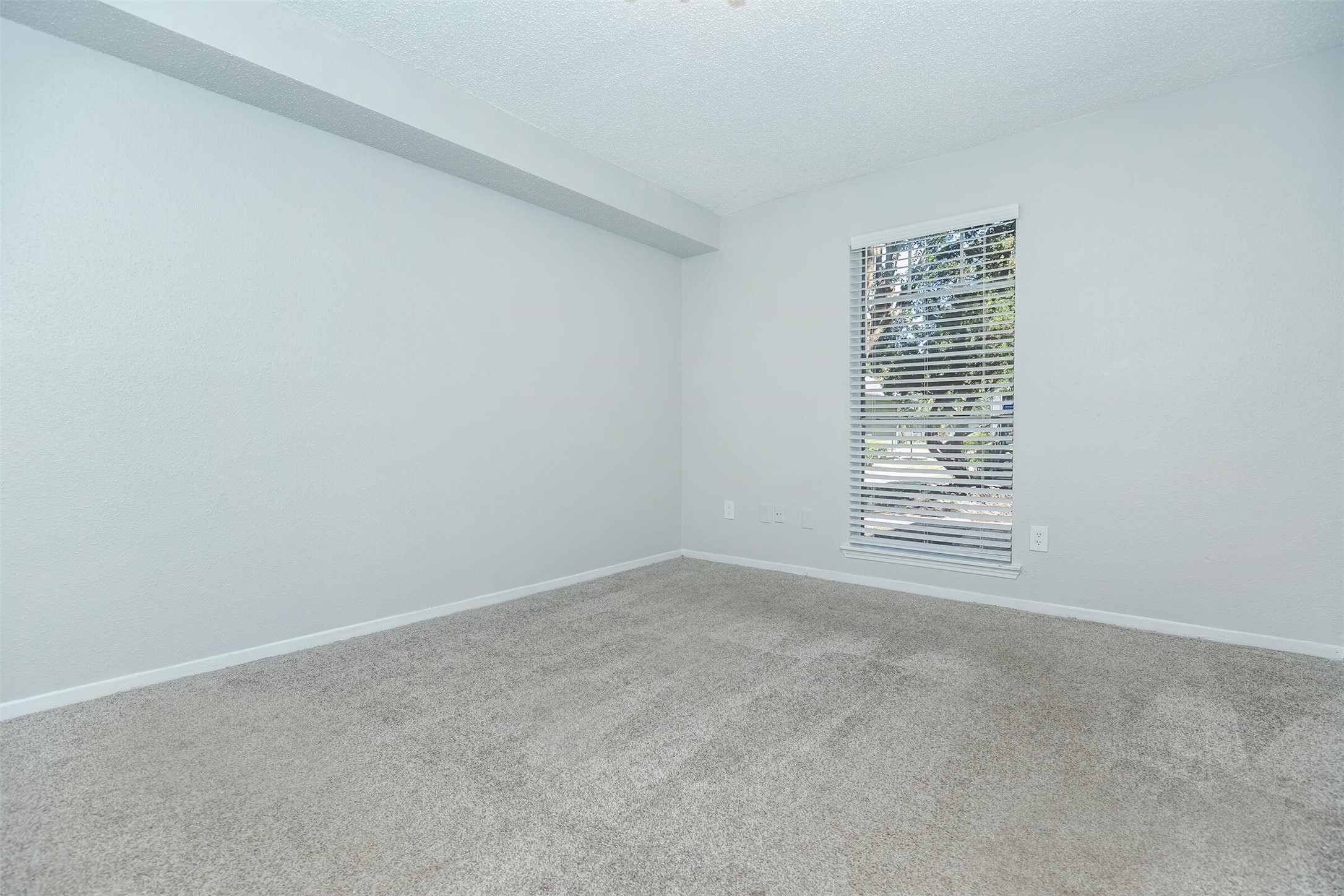 3001 Hillcroft Street, Unit G0605 Houston, TX 77057 - Photo 28 of 50 a view of an empty room with a window