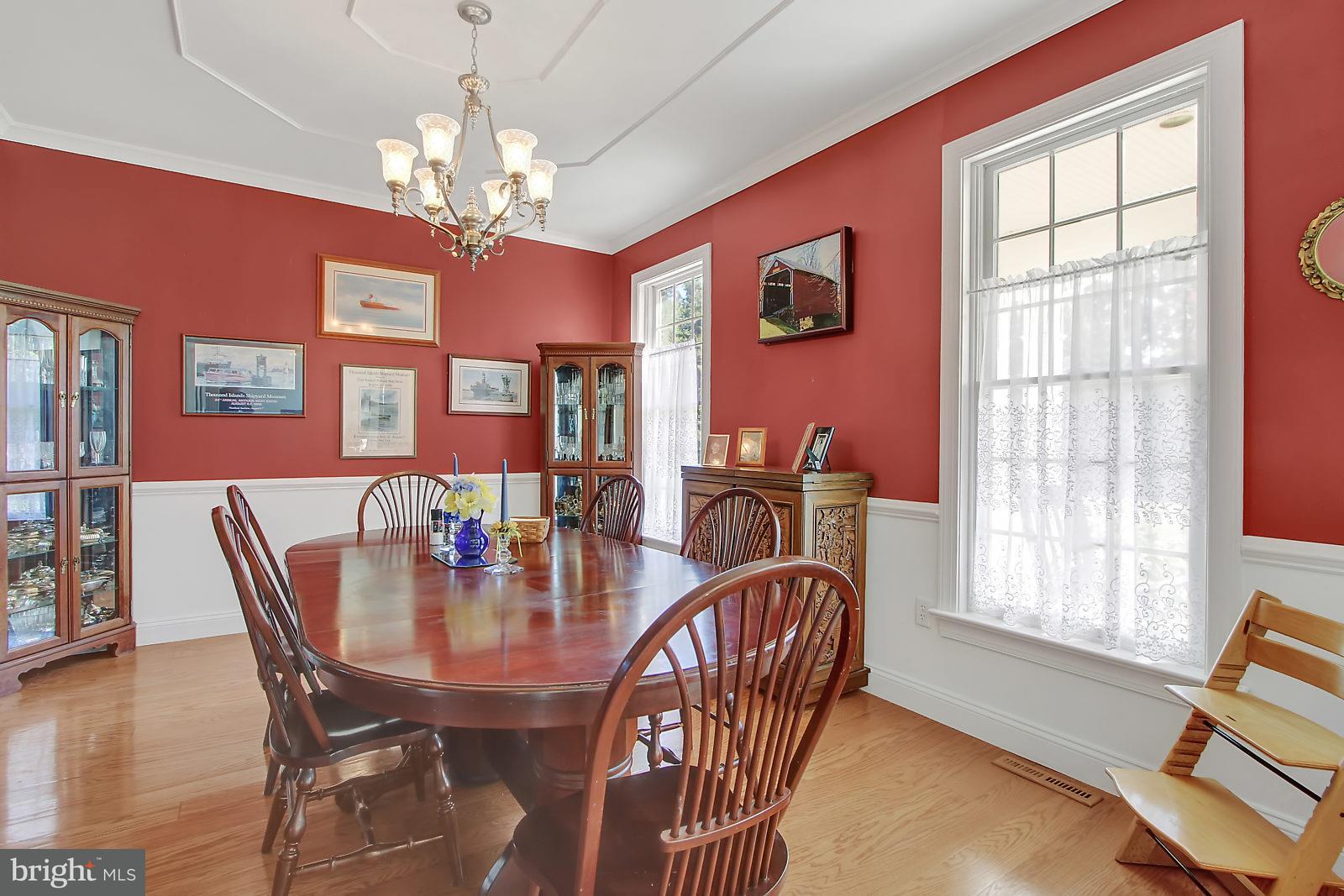 3129 Fairfield Road Gettysburg, PA 17325 - Photo 28 of 47 a dining room with furniture a livingroom and chandelier