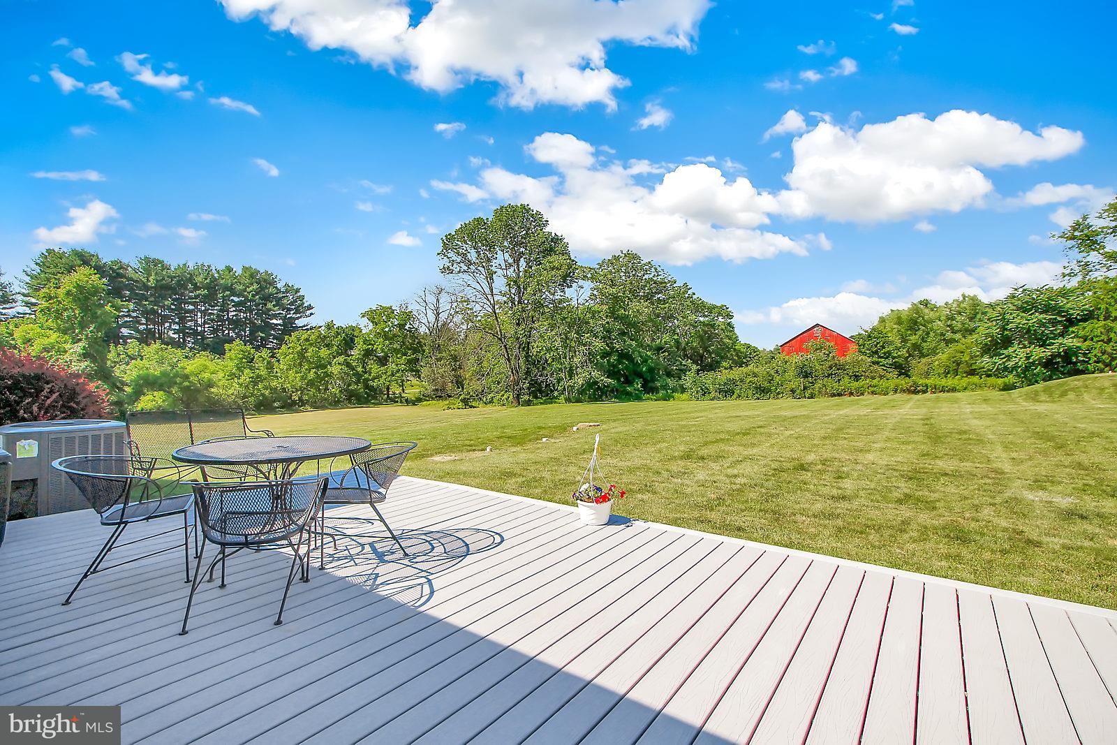 3129 Fairfield Road Gettysburg, PA 17325 - Photo 8 of 47 a view of a deck with chairs