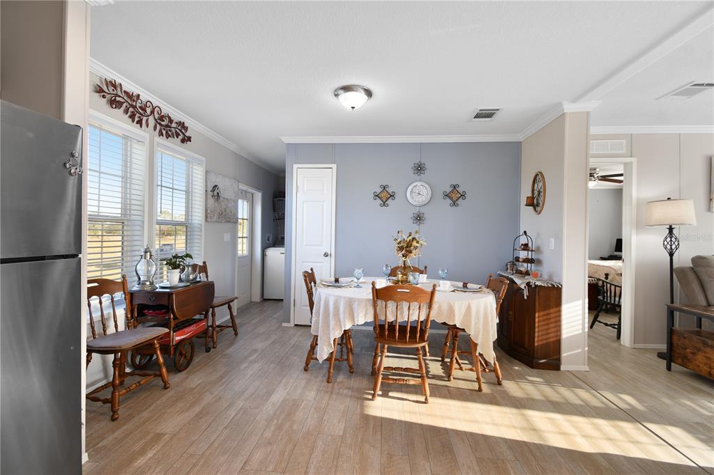 10989 Northwest Lily County Line Road Ona, FL 33865 - Photo 44 of 87 a living room with furniture and a wooden floor