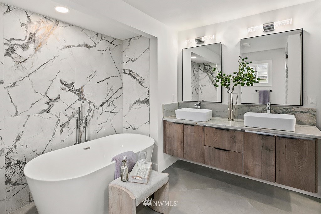 4906 Southwest Hinds Street Seattle, WA 98116 - Photo 8 of 40 a bathroom with a bathtub and a sink