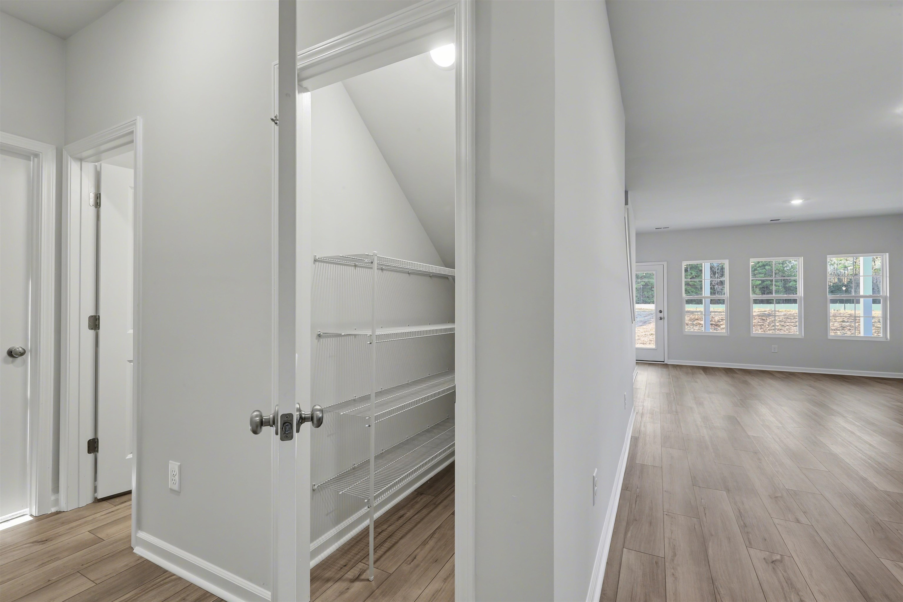 3431 Logan Street Conway, SC 29526 - Photo 13 of 31 Corridor featuring light wood-style floors and recessed lighting