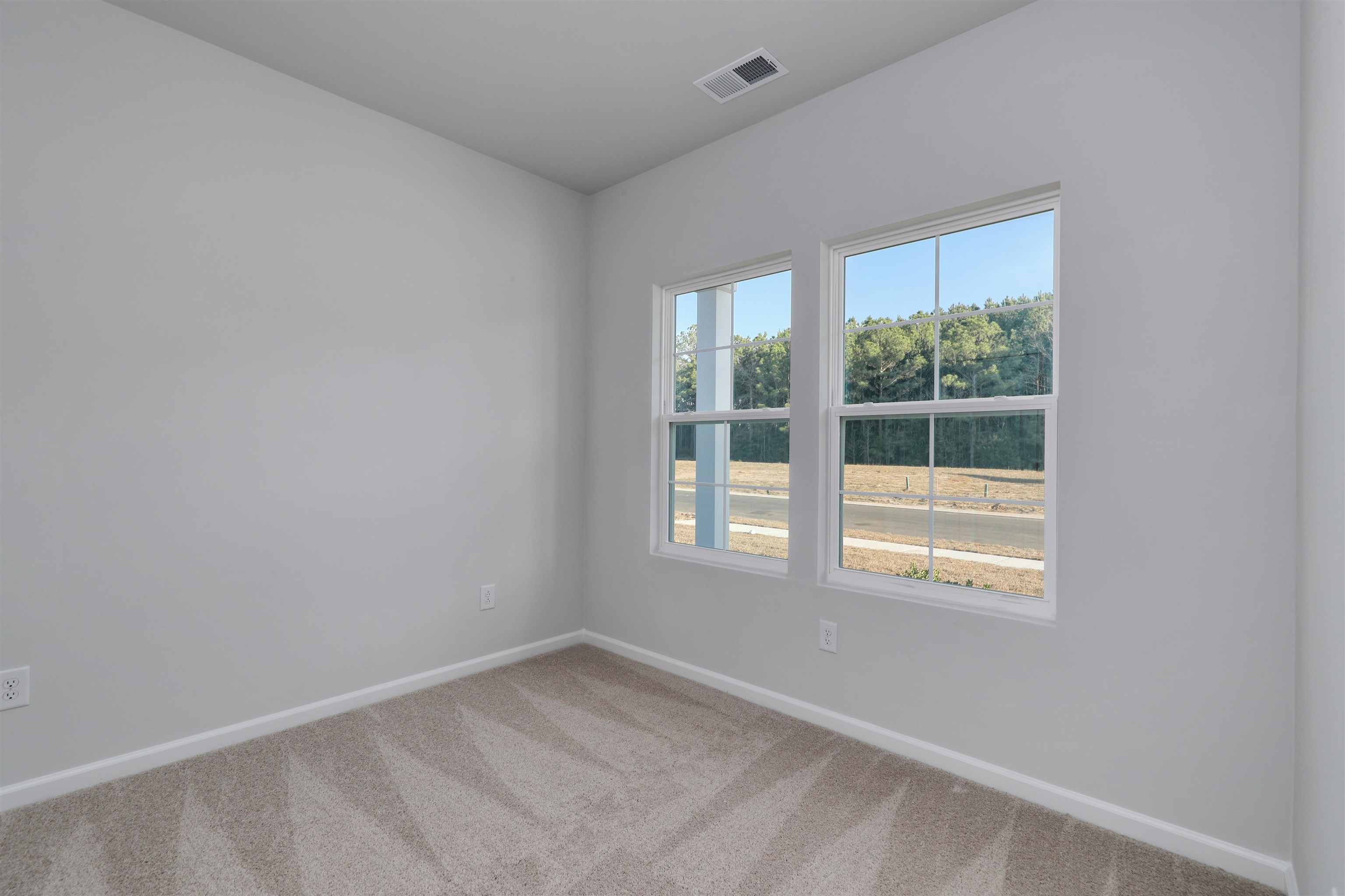 3431 Logan Street Conway, SC 29526 - Photo 26 of 31 Empty room featuring baseboards and carpet floors