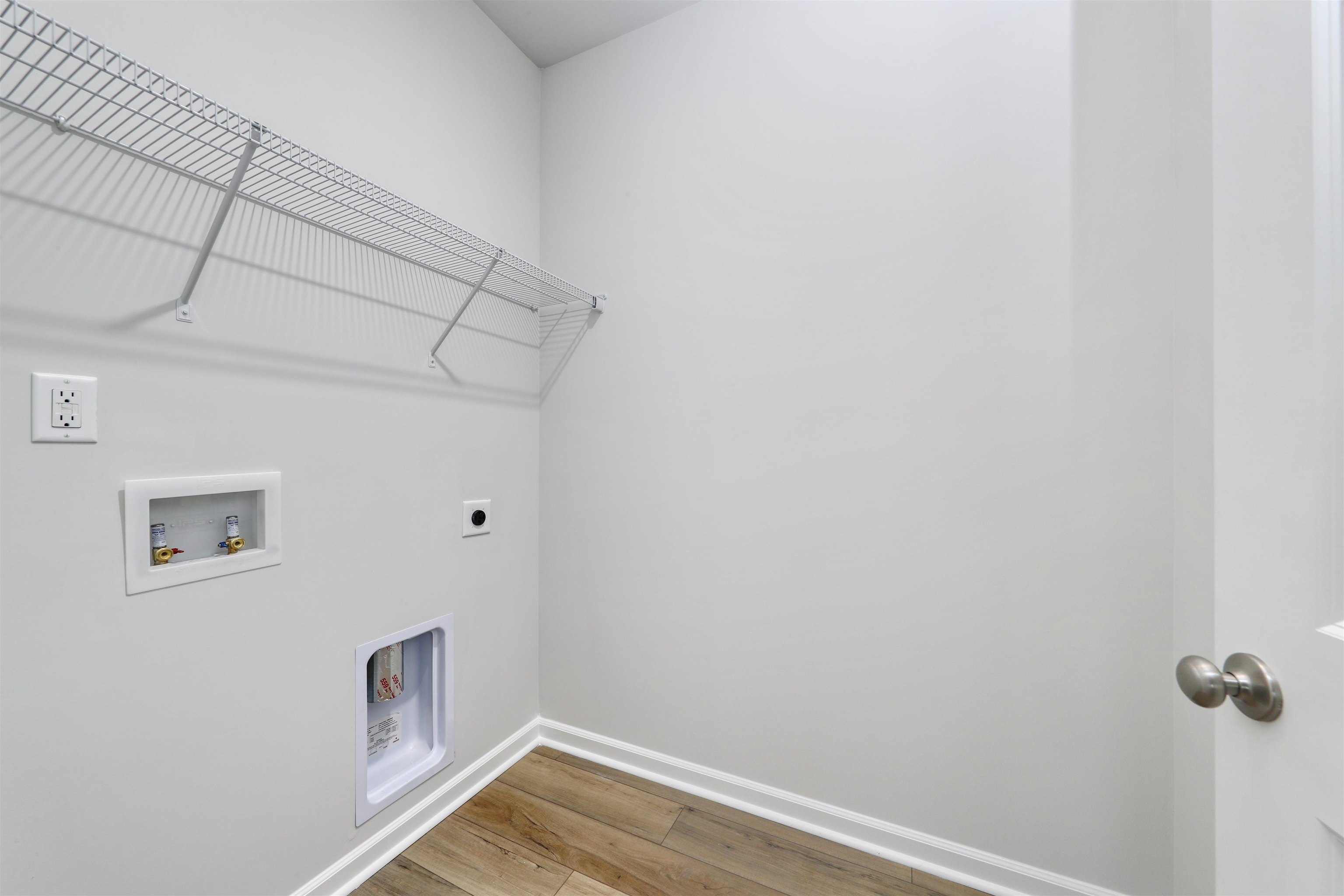 3431 Logan Street Conway, SC 29526 - Photo 7 of 31 Washroom featuring light wood-style floors, hookup for a washing machine, and electric dryer hookup