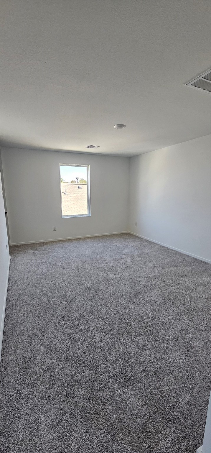 21310 Offida Lane New Caney, TX 77357 - Photo 19 of 24 an empty room with windows