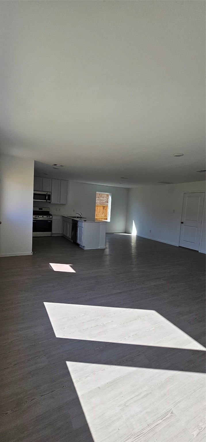 21310 Offida Lane New Caney, TX 77357 - Photo 24 of 24 a view of empty room with wooden floor
