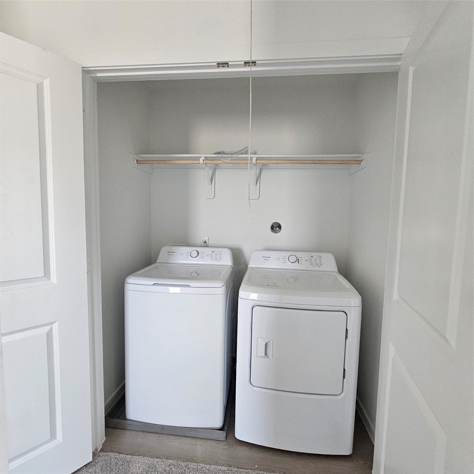 21310 Offida Lane New Caney, TX 77357 - Photo 9 of 24 a utility room with dryer and washer