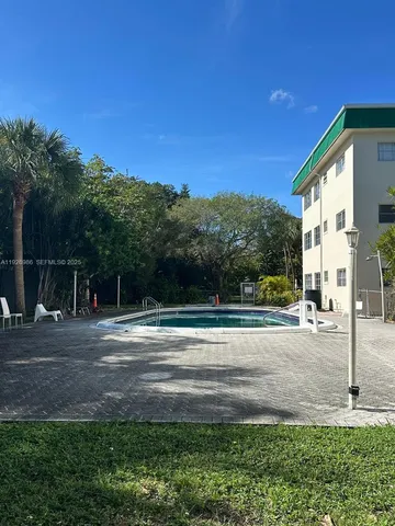 a living room with a couch and a table