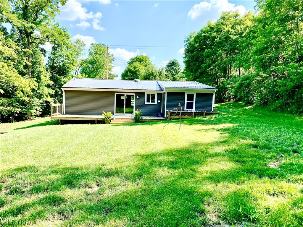 3163 Styx Hill Road Medina, OH 44256 - Photo 13 of 18 A view of the back of the house showing the deck.