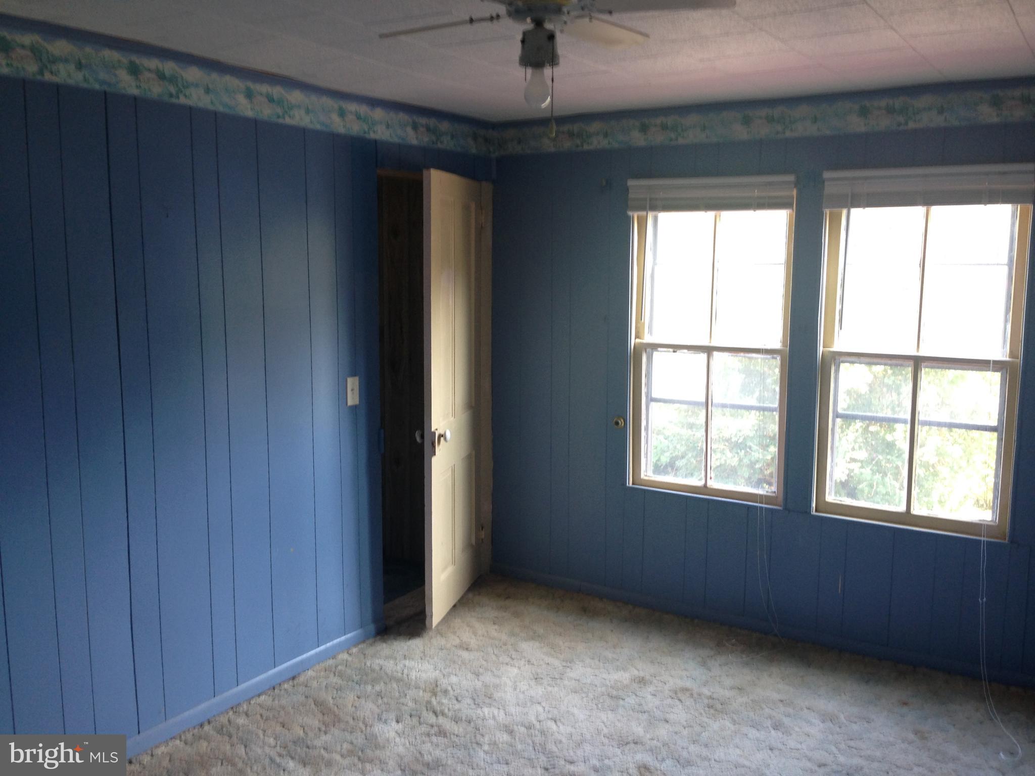 8321 Newark Road Newark, MD 21841 - Photo 12 of 33 an empty room with windows