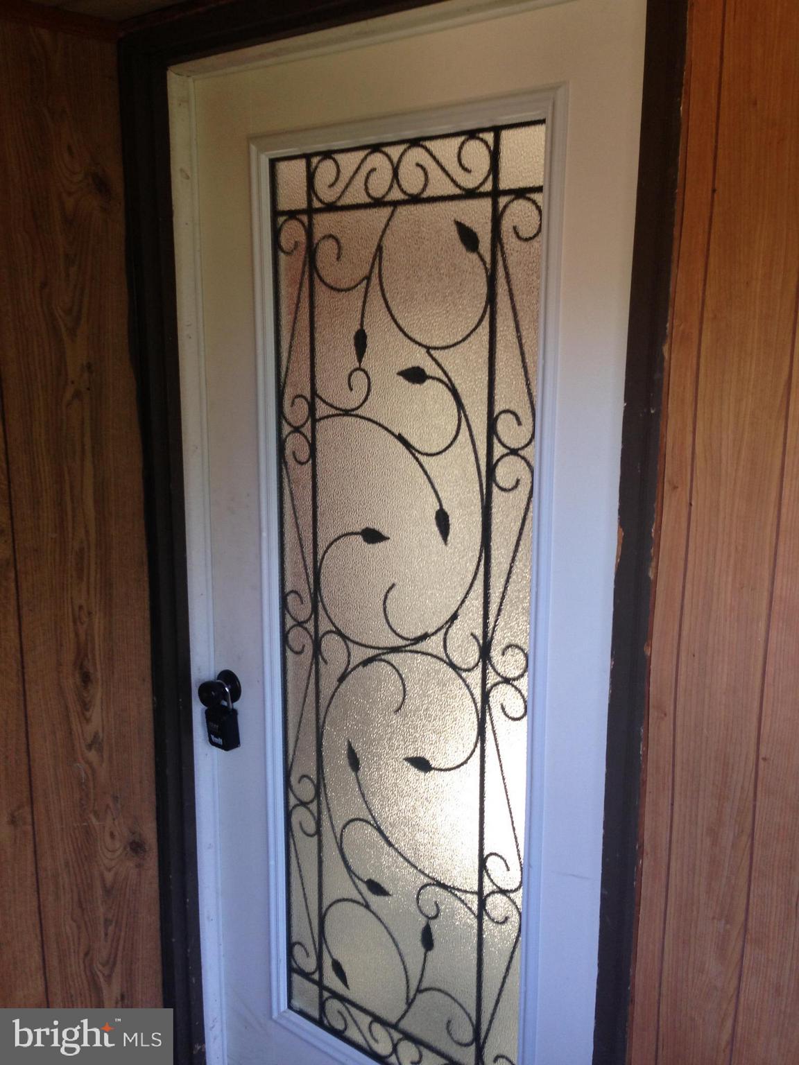 8321 Newark Road Newark, MD 21841 - Photo 19 of 33 a picture of a glass door with a glass door