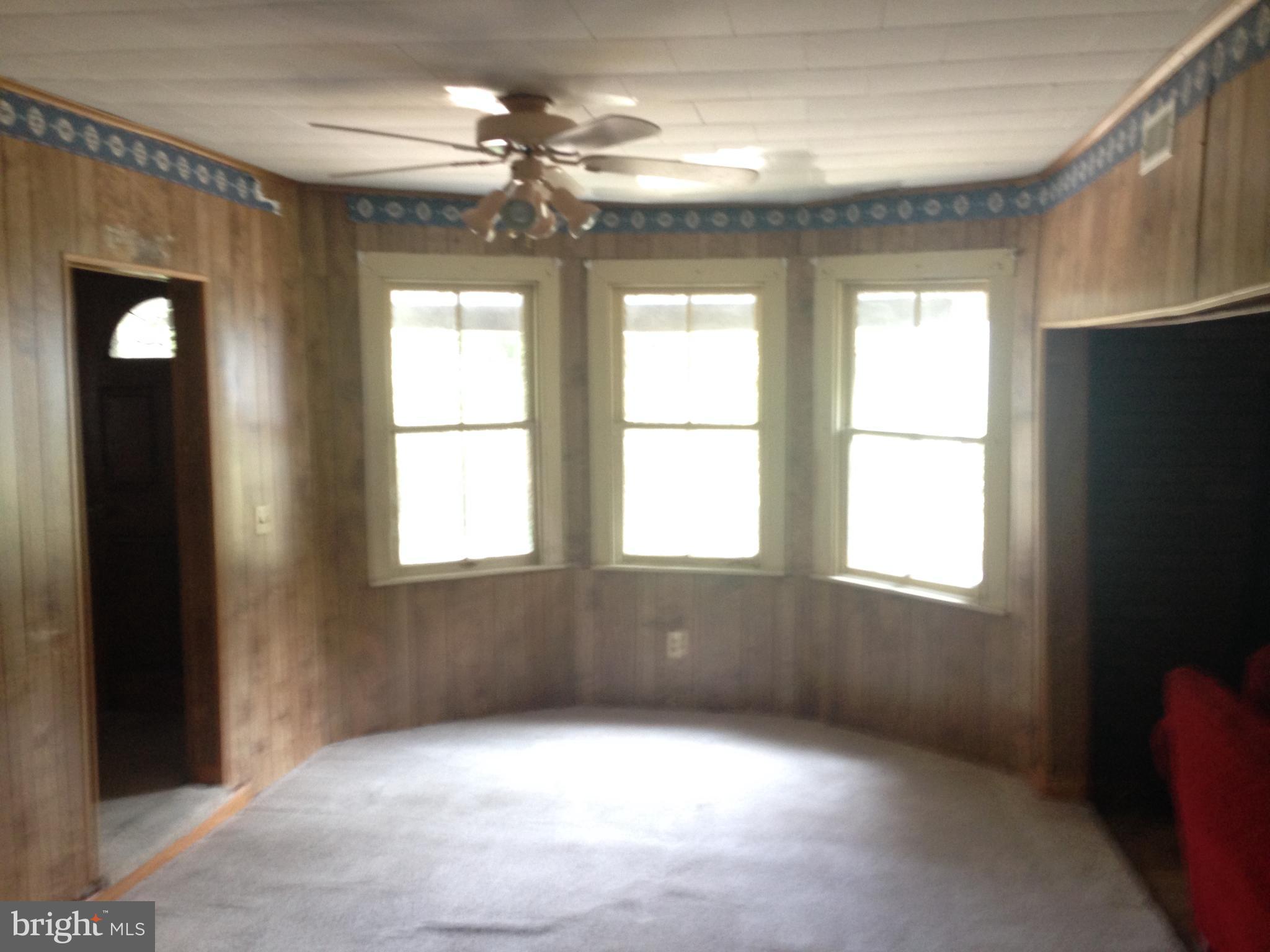 8321 Newark Road Newark, MD 21841 - Photo 23 of 33 a view of an empty room with a window