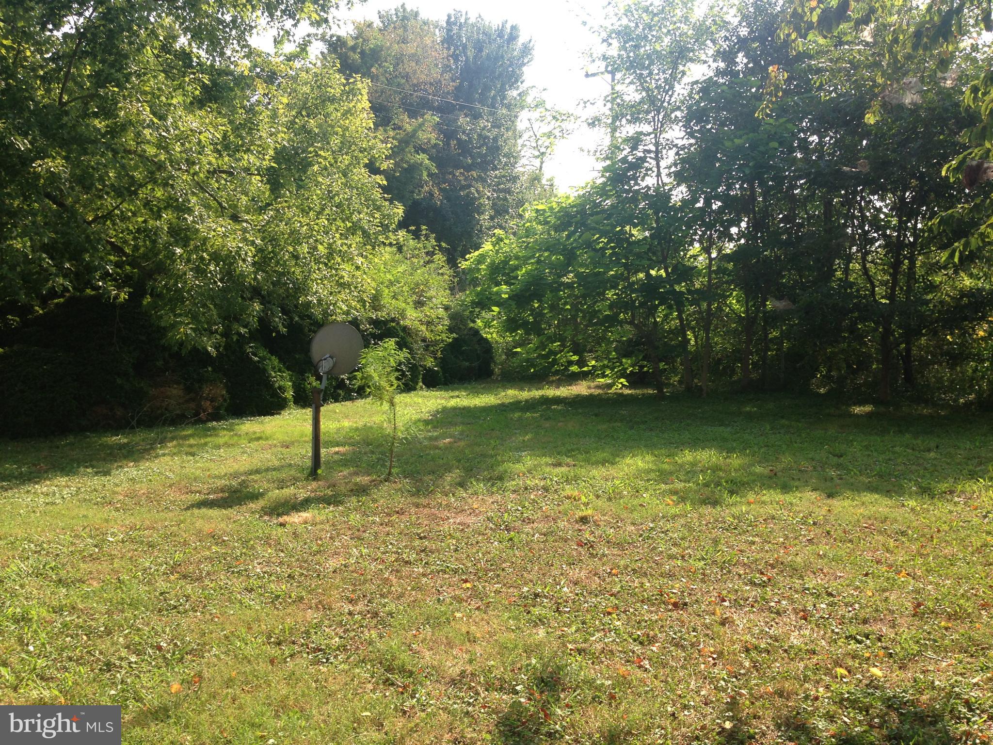 8321 Newark Road Newark, MD 21841 - Photo 33 of 33 a backyard of a house with lots of green space