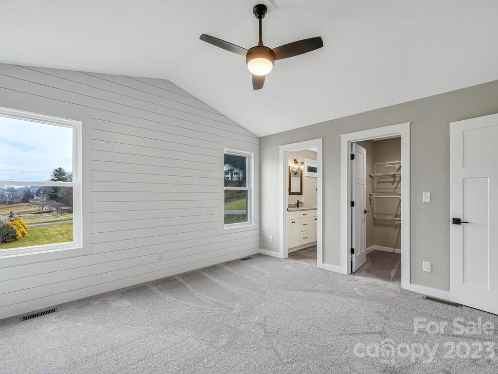 921 Newfound Road Leicester, NC 28748 - Photo 26 of 28 a view of an empty room with a window