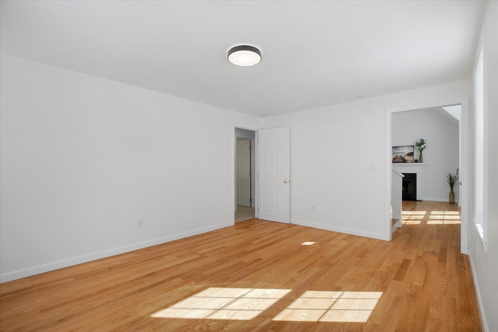 10 Butler Lane Mashpee, MA 02649 - Photo 17 of 42 a view of empty room with wooden floor