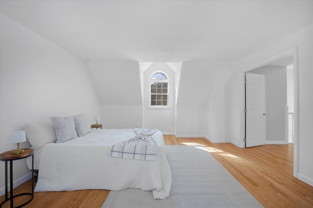 10 Butler Lane Mashpee, MA 02649 - Photo 32 of 42 a bedroom with a bed and a window