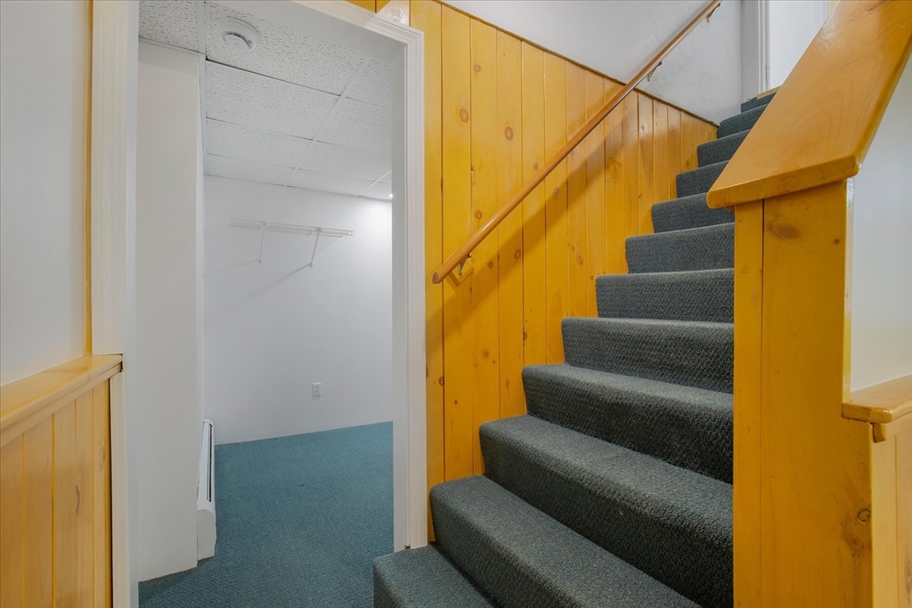10 Butler Lane Mashpee, MA 02649 - Photo 34 of 42 a view of stairs and wooden floor