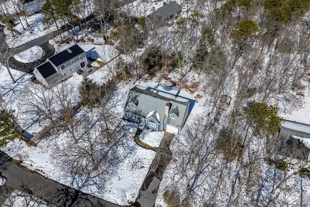 10 Butler Lane Mashpee, MA 02649 - Photo 41 of 42 a view of a house with a yard