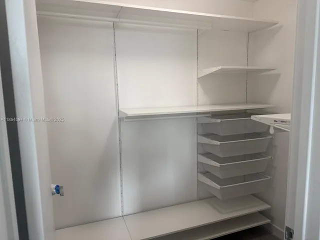 a view of a city with tall buildings