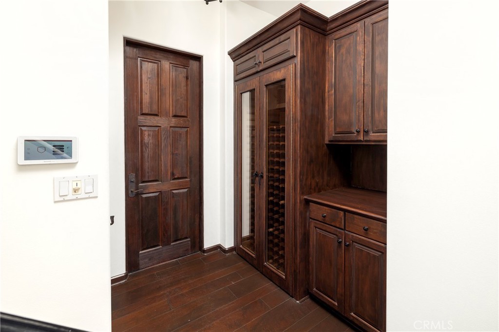 6 Premiere Point Newport Coast, CA 92657 - Photo 15 of 36 a view of hallway with wooden floor