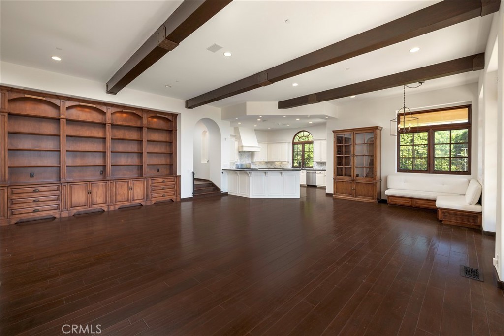 6 Premiere Point Newport Coast, CA 92657 - Photo 17 of 36 an empty room with wooden floor and windows
