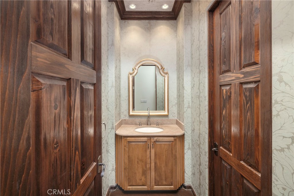 6 Premiere Point Newport Coast, CA 92657 - Photo 18 of 36 a bathroom with a sink and a mirror