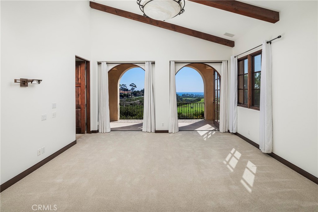 6 Premiere Point Newport Coast, CA 92657 - Photo 21 of 36 a view of an empty room with window and mirror