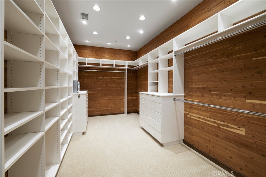 6 Premiere Point Newport Coast, CA 92657 - Photo 24 of 36 a view of walk in closet with empty racks