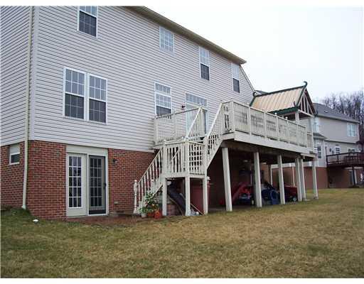 270 Field Club Circle McKees Rocks, PA 15136 - Photo 14 of 18 Exterior Back. LARGE DECK OFF KITCHEN AND BREAKFAST AREA WITH WALKOUT FROM LOWER LEVEL