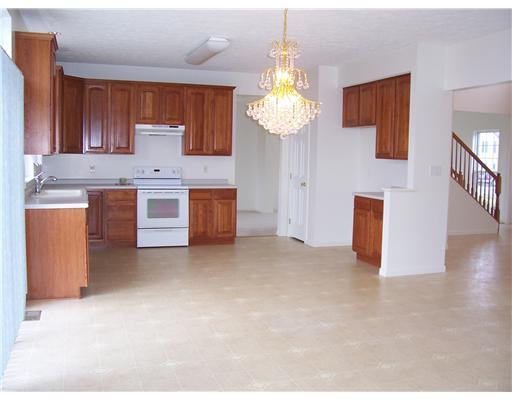 270 Field Club Circle McKees Rocks, PA 15136 - Photo 8 of 18 Kitchen. CHERRY CABINETRY IN THE LARGE KITCHEN WITH PANTRY AND PLENTY OF COUNTER SPACE, ROOM FOR AN ISLAND
