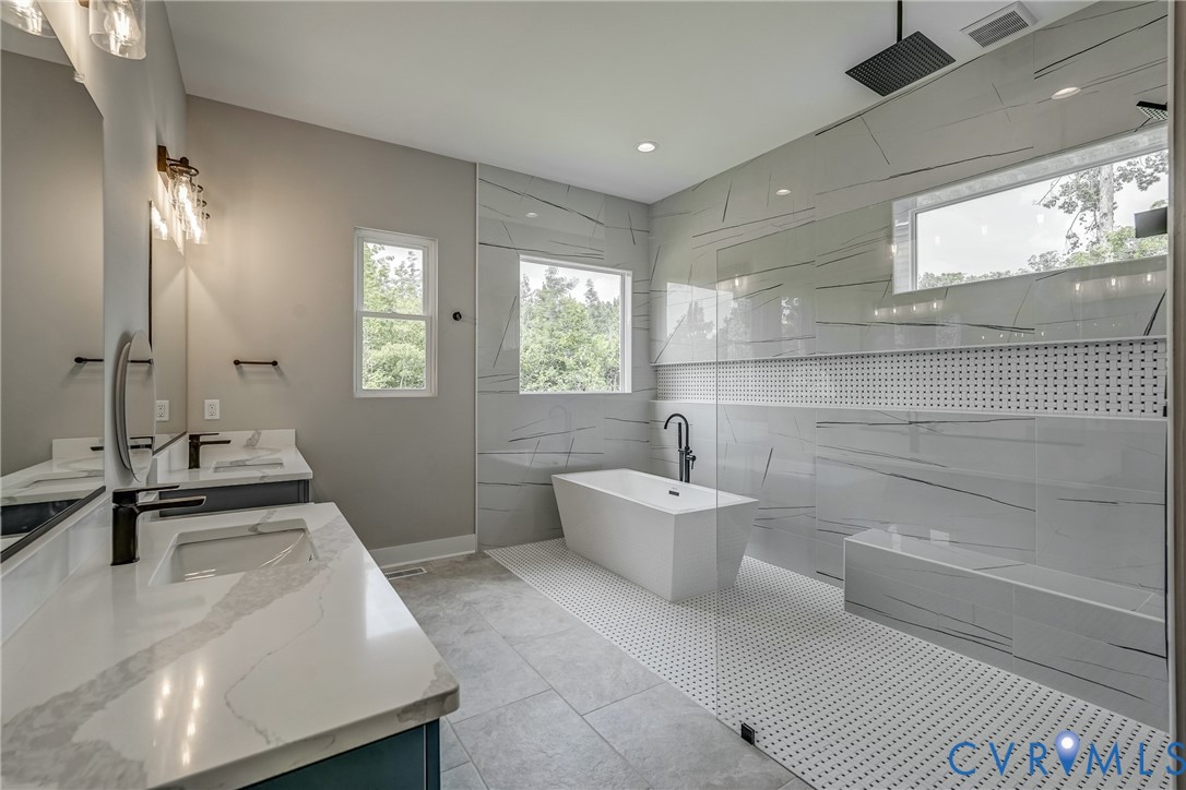 3519 Ampfield Way Midlothian, VA 23112 - Photo 11 of 18 a bathroom with a tub sink and mirror