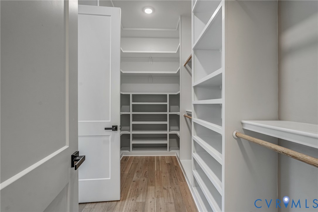 3519 Ampfield Way Midlothian, VA 23112 - Photo 12 of 18 a view of walk in closet with empty racks