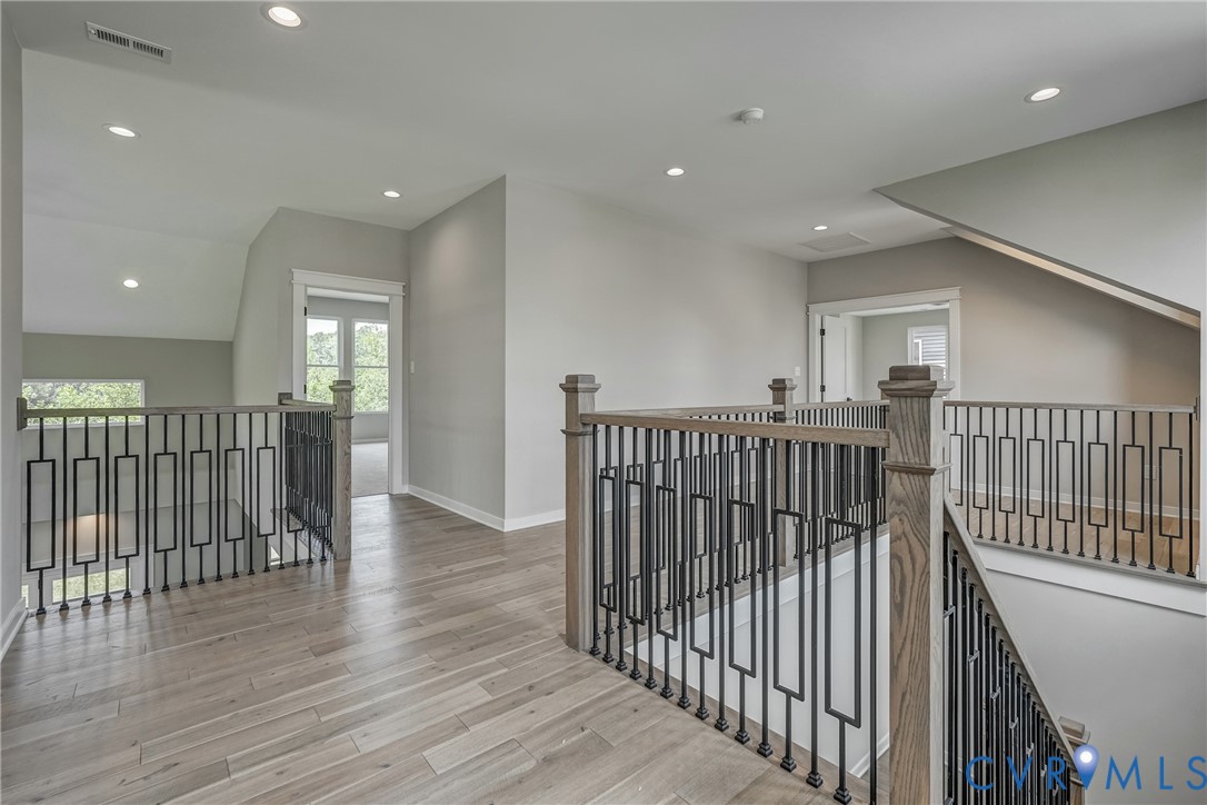 3519 Ampfield Way Midlothian, VA 23112 - Photo 15 of 18 a view of a hallway with wooden floor
