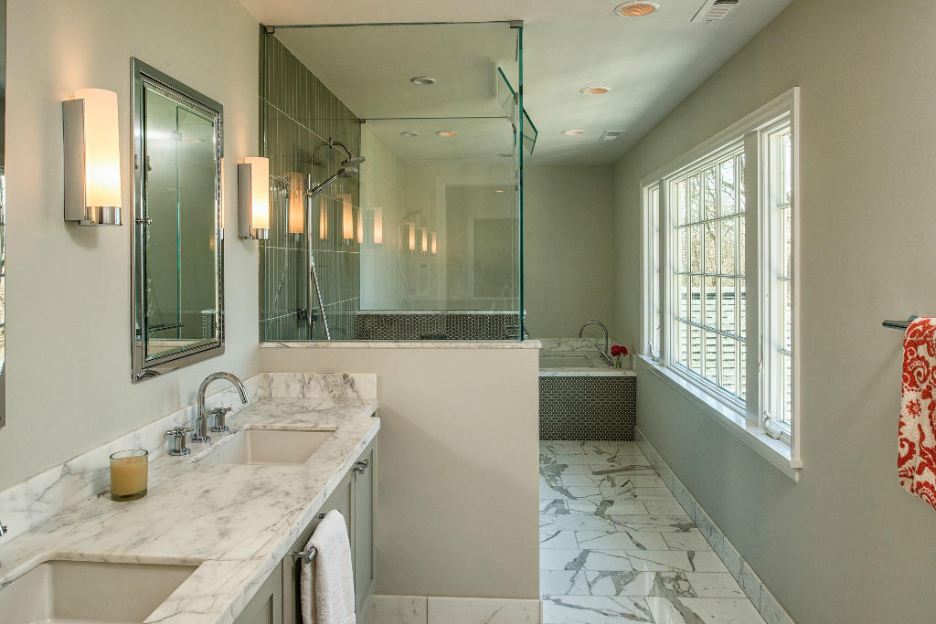 174 Marshall Ridge Road New Canaan, CT 06840 - Photo 19 of 30 a bathroom with a granite countertop sink and a large mirror