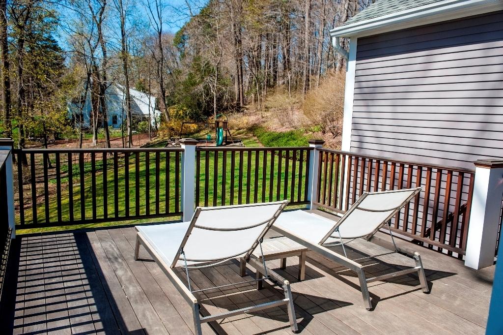 174 Marshall Ridge Road New Canaan, CT 06840 - Photo 28 of 30 a view of a chairs in wooden deck