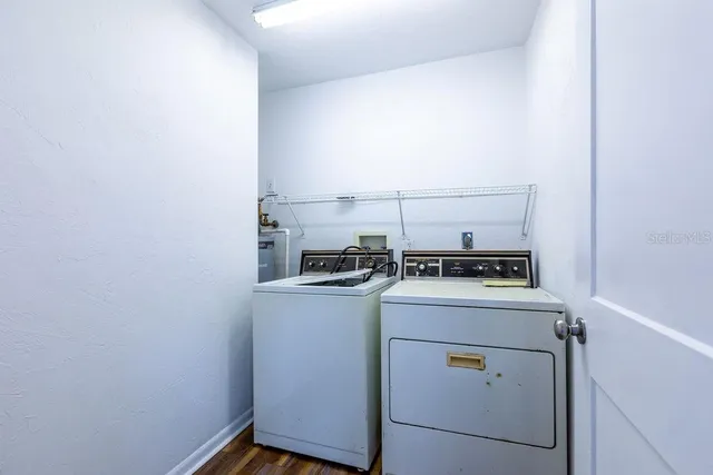 a utility room with dryer and washer