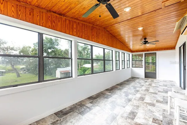 a view of a building with a backyard