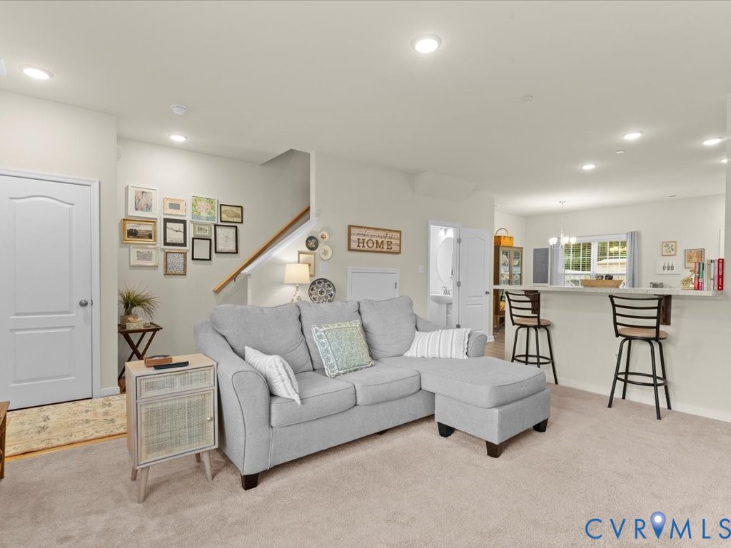 12137 Perdue Springs Loop Chester, VA 23831 - Photo 11 of 45 Living area featuring recessed lighting, light col