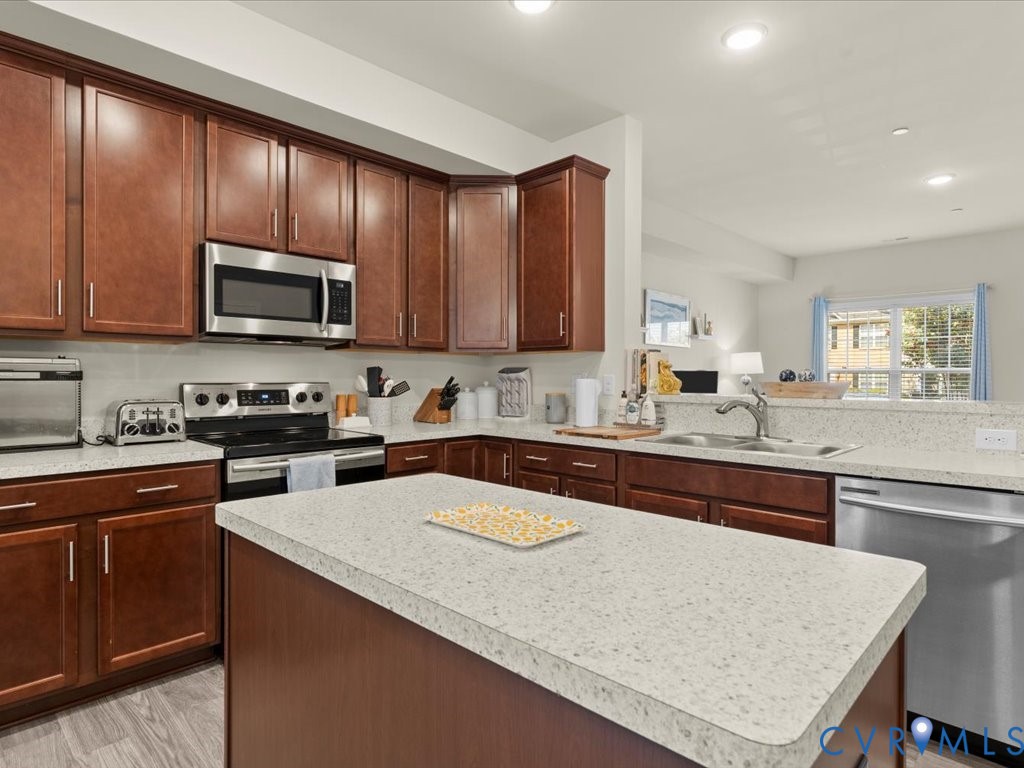 12137 Perdue Springs Loop Chester, VA 23831 - Photo 17 of 45 Kitchen featuring stainless steel appliances, rece
