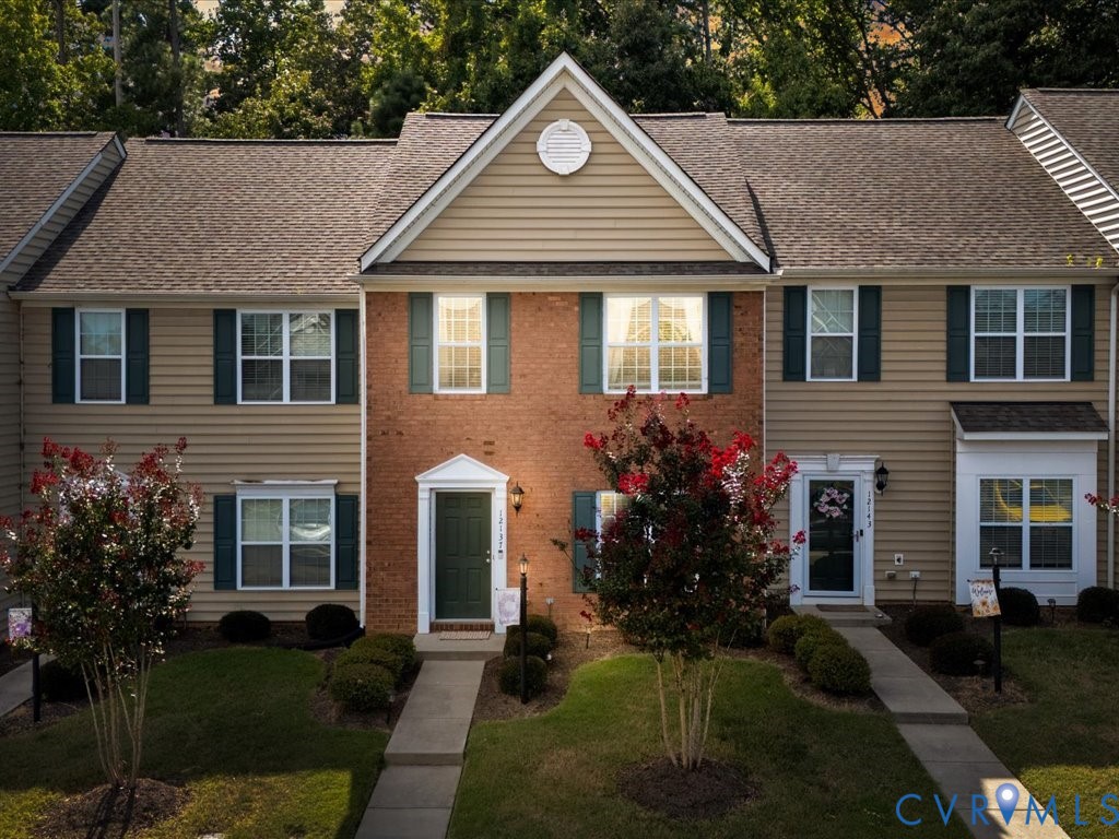 12137 Perdue Springs Loop Chester, VA 23831 - Photo 2 of 45 Colonial home with a front yard, roof with shingle