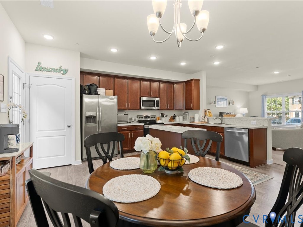 12137 Perdue Springs Loop Chester, VA 23831 - Photo 21 of 45 Dining area featuring light wood finished floors,