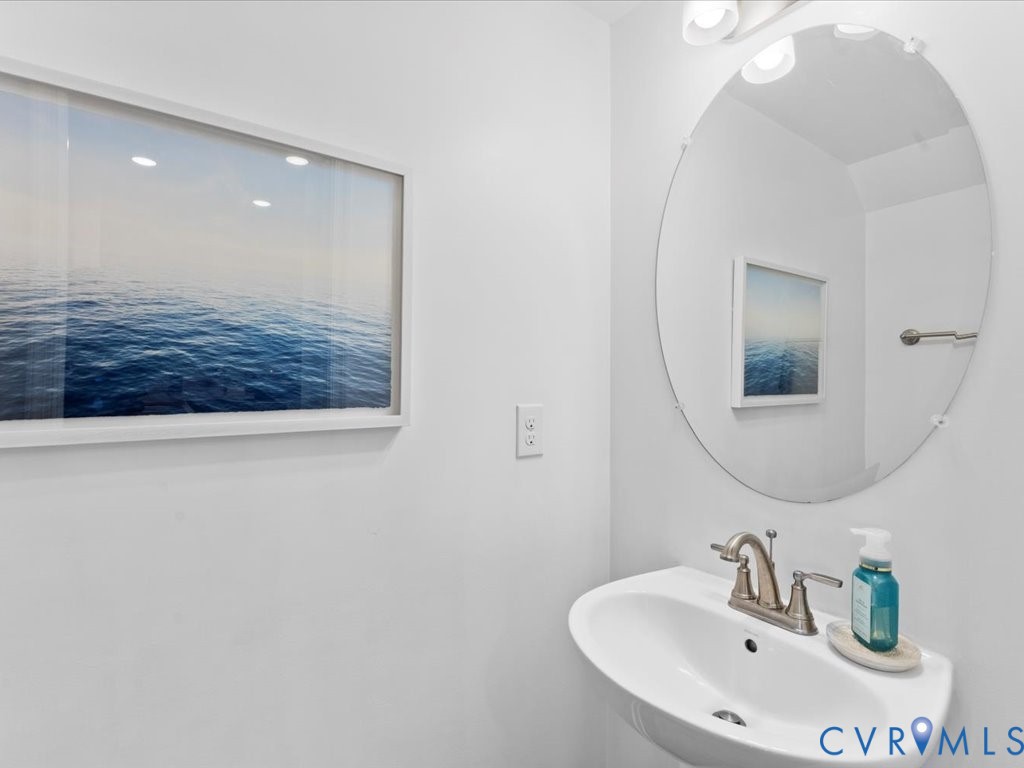 12137 Perdue Springs Loop Chester, VA 23831 - Photo 22 of 45 Bathroom featuring a sink