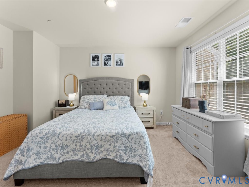 12137 Perdue Springs Loop Chester, VA 23831 - Photo 27 of 45 Bedroom featuring light colored carpet and recesse