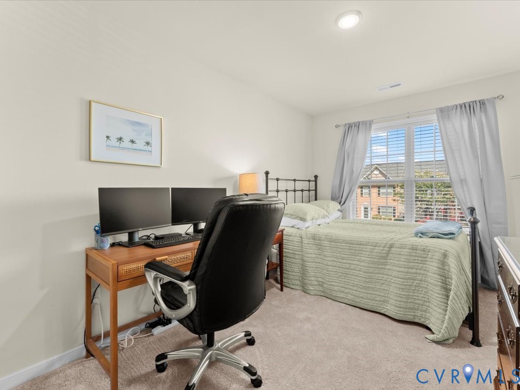 12137 Perdue Springs Loop Chester, VA 23831 - Photo 36 of 45 Bedroom featuring light colored carpet, a desk, an